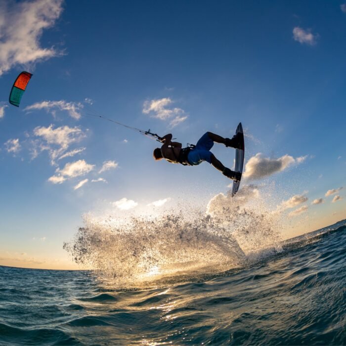 person-surfing-flying-parachute-same-time-kitesurfing-bonaire-caribbean